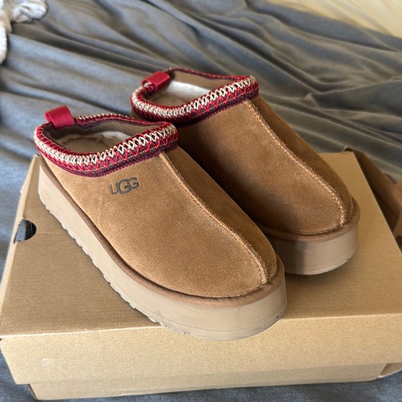 UGG Tan Suede Slip-Ons with Red Trim - Picture 1 of 3